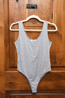 GREY SLEEVELESS BODYSUIT